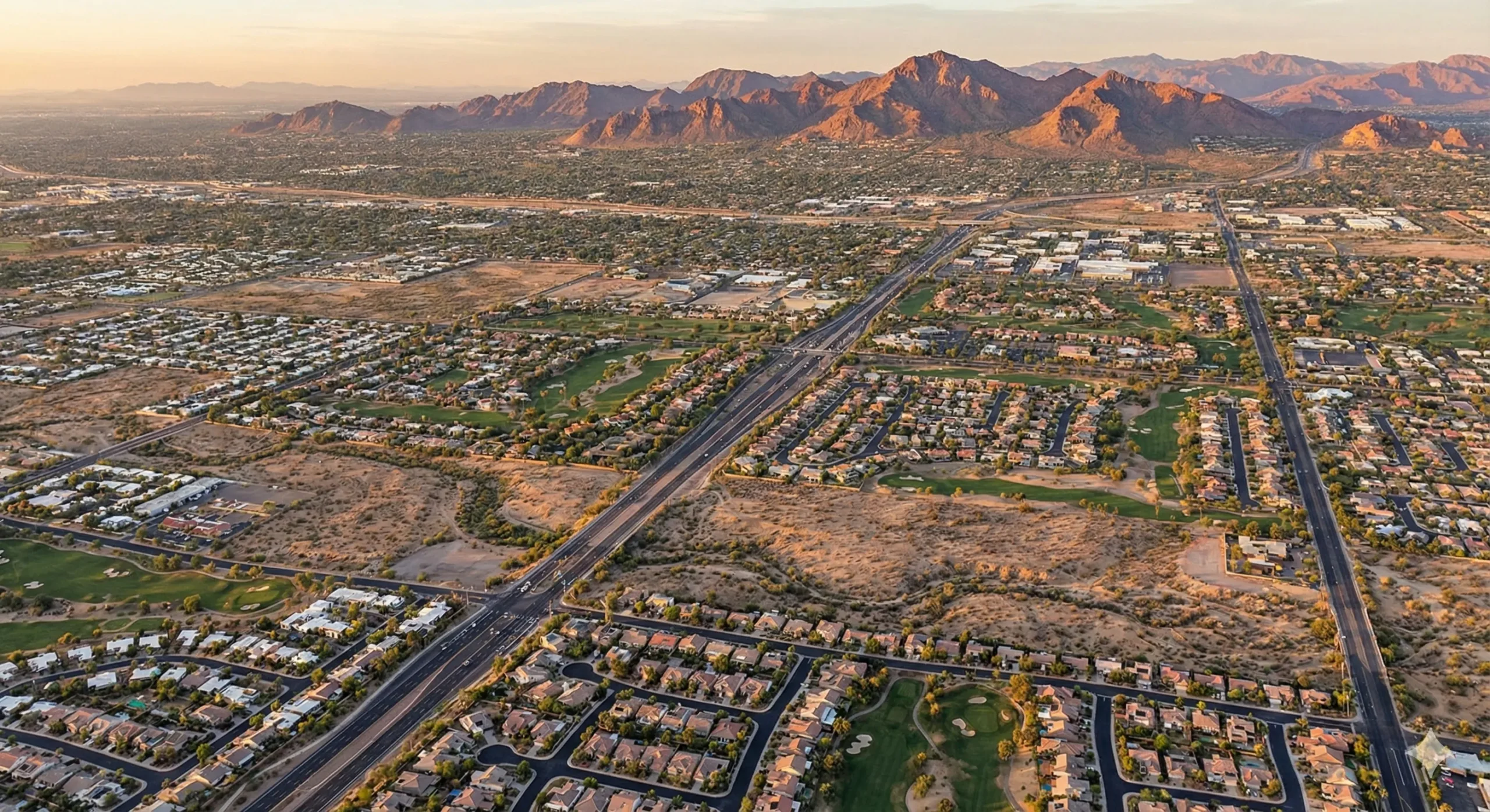 Aerial view of Scottsdale Arizona neighborhoods stretching 31 miles from Old Town to North Scottsdale with McDowell Mountains